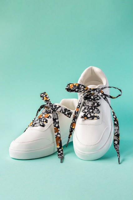 Lacets noirs fleuris or en Coton - Élégance floral